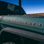 Protective finish being shown on a Jeep, rubicon, blue sky in background