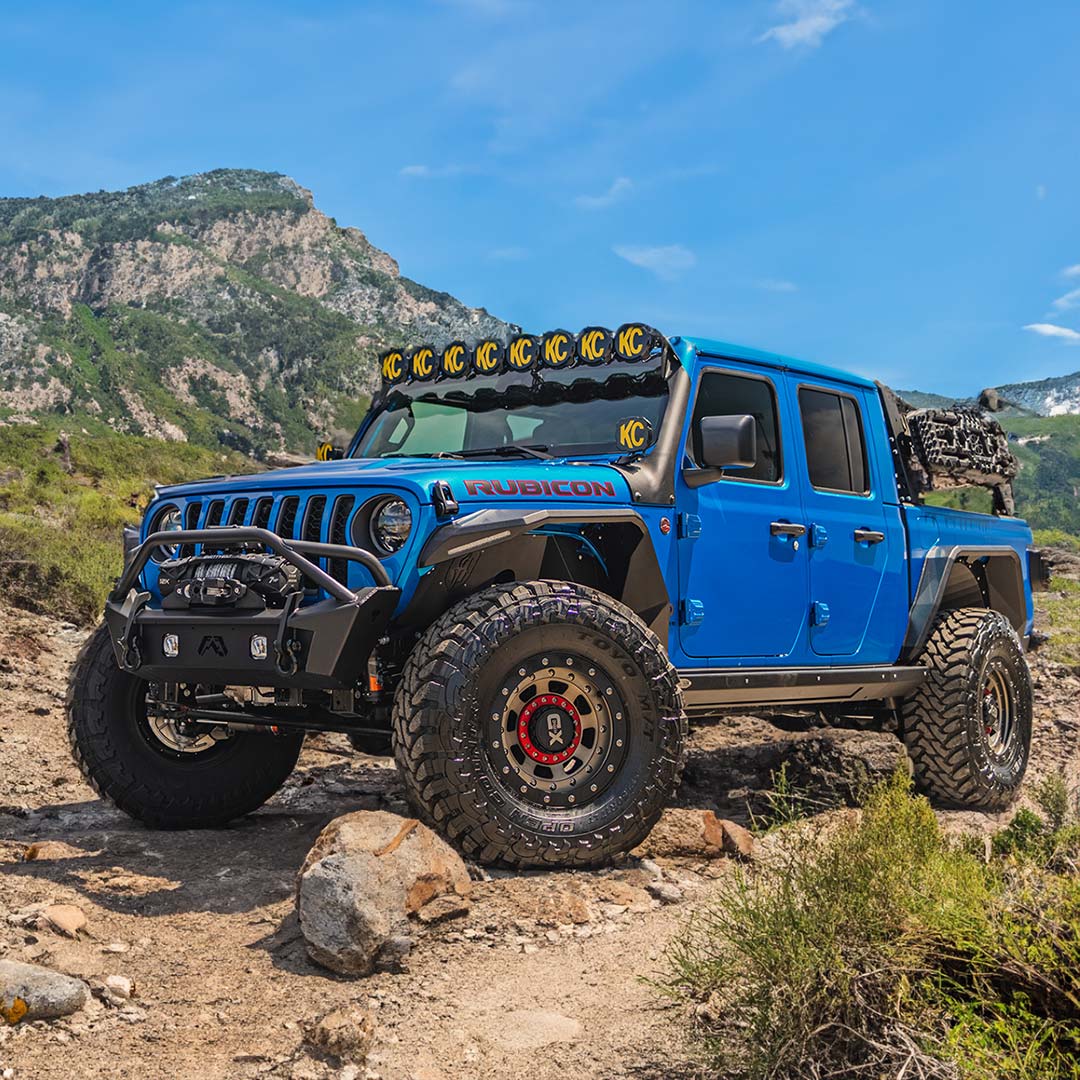 Blue Gladiator JT on Trail in Mountains