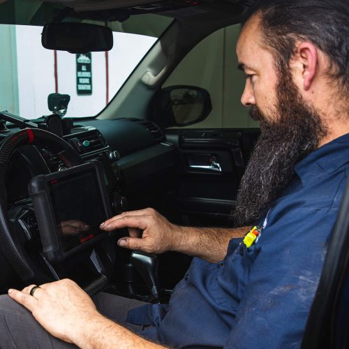 Man sitting inside of a car